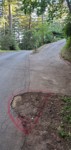 Seems cars cut the corner driving over this dirt area when passing using Brockenbrough's driveway